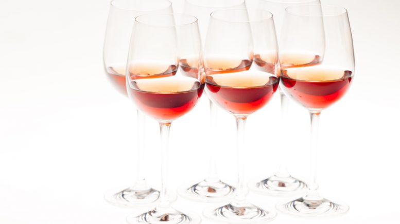 rose stockfresh 3970815 wine glasses with rose wine sizeS